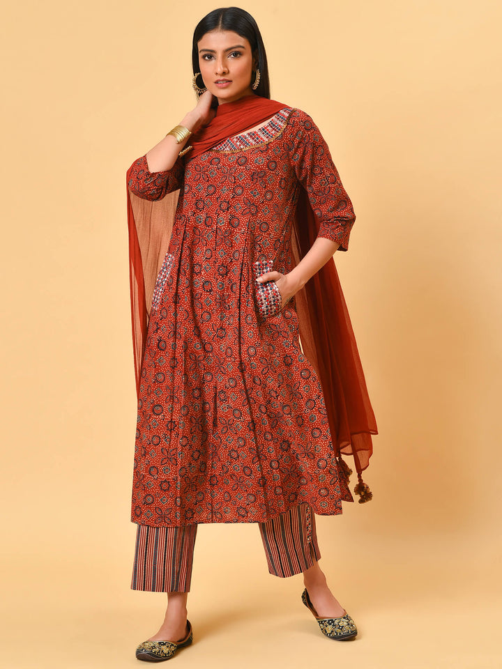 Indian apple cinnamon summer in a maroon ikat kurta pant and dupatta