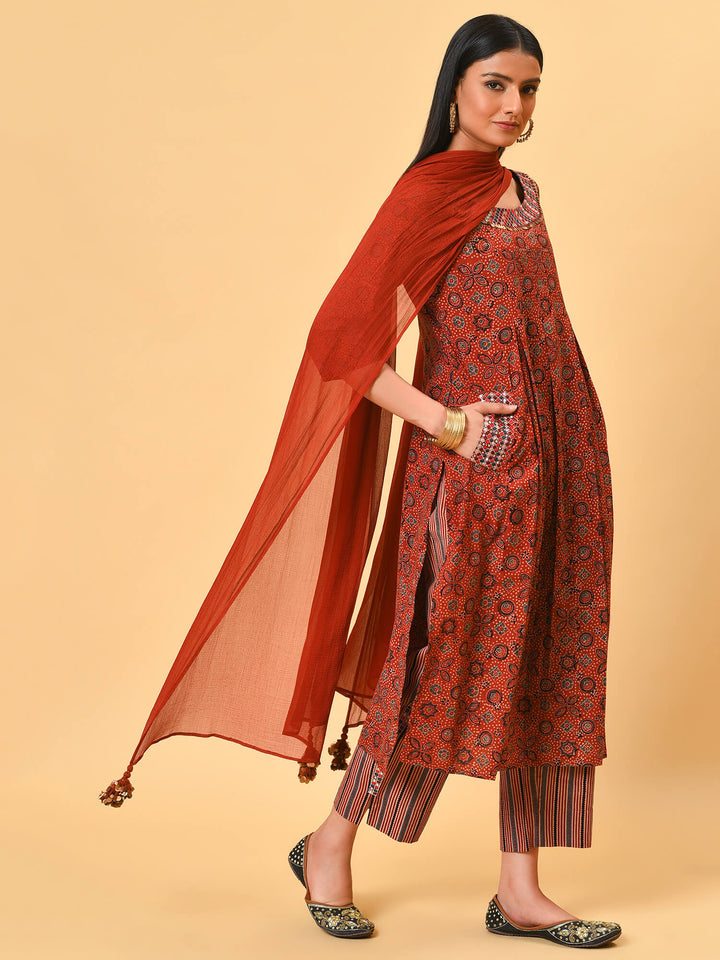 Indian apple cinnamon summer in a maroon ikat kurta pant and dupatta