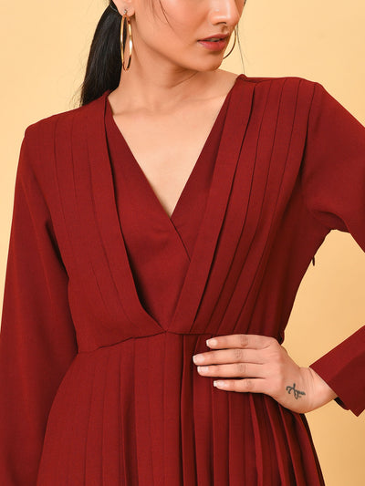 Ultra chic in the maroon pleated long dress