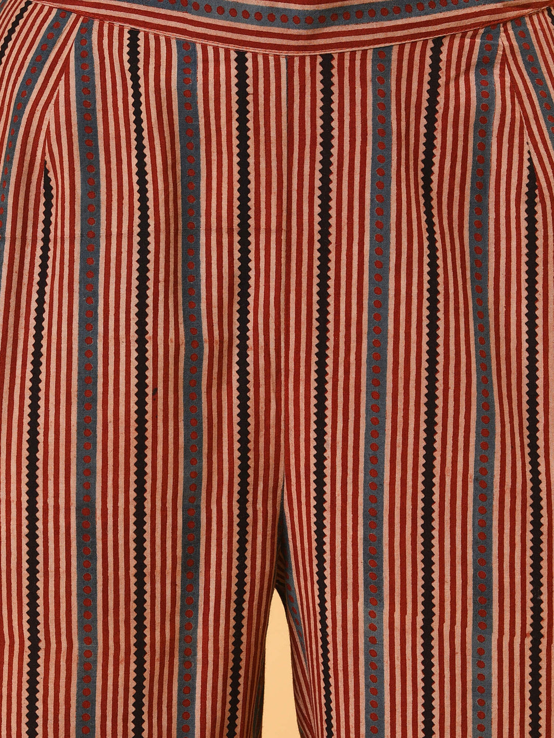 Indian apple cinnamon summer in a maroon ikat kurta pant and dupatta