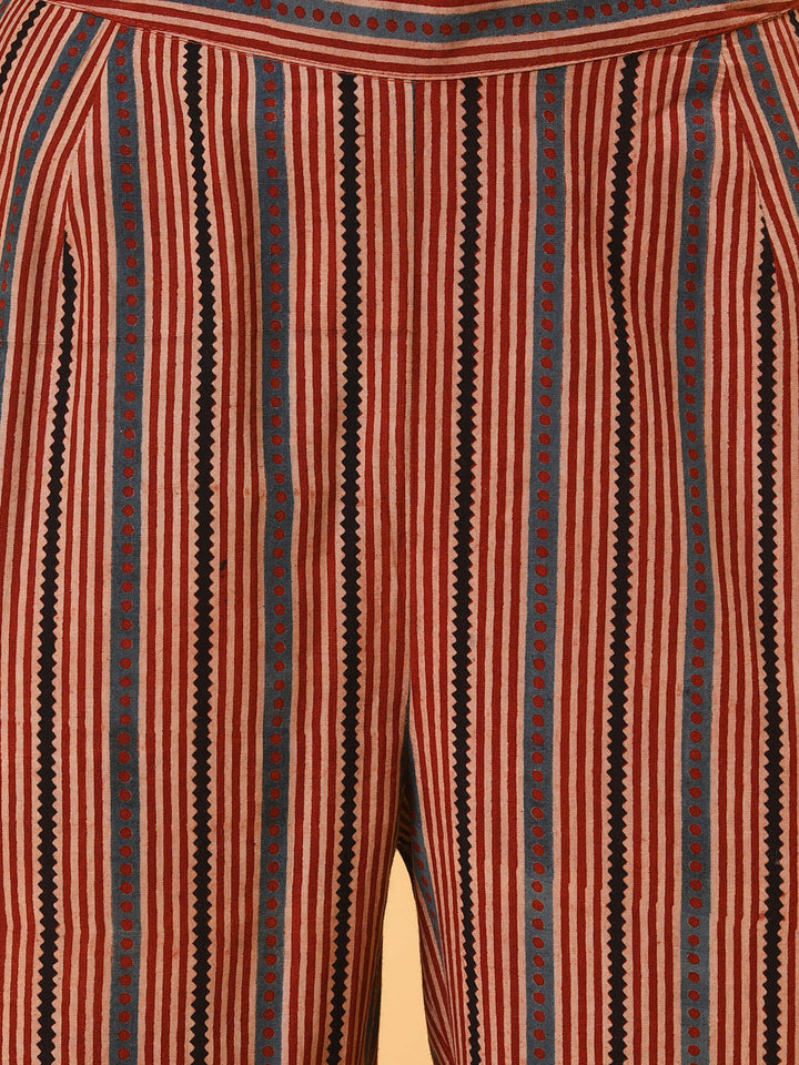 Indian apple cinnamon summer in a maroon ikat kurta pant and dupatta